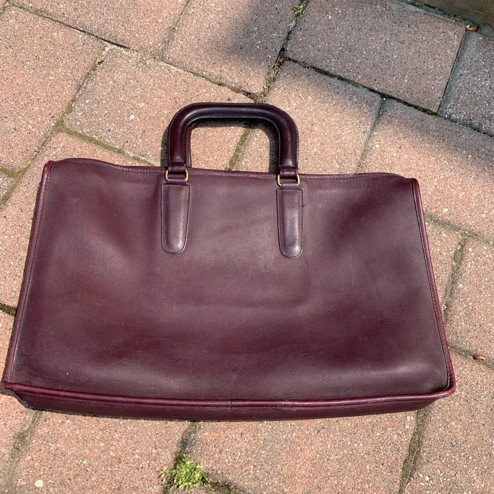 Coach brief case. Finish your professional look with this classic accessory!
